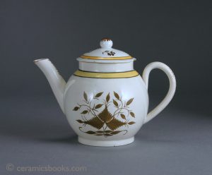 Child or bachelor size creamware teapot with brown and yellow enamelled decor. 100mm High. c.1790-1810. AP/250.
