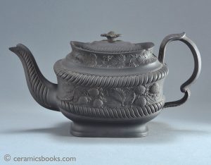 Black basalt strawberry pattern teapot probably Leeds Pottery. 159mm High. c.1810-1825. AP/771.