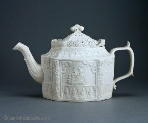 White felspathic stoneware teapot with sprigs incl. "Hebe and the Eagle" and "Peace Destroying the Implements of War". Possibly Sowter & Co. Mexborough. c.1795-1810. AP/220.