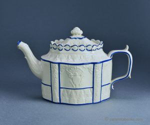 White felspathic stoneware teapot with sprigs of the American Eagle and Peace. Possibly Sowter & Co. c.1795-1810. AP/640.