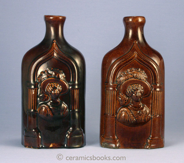 Two treacleware spirit flasks depicting Queen Victoria and her mother the Duchess of Kent. With slight differences indicating different manufacturers. c.1837-1860.