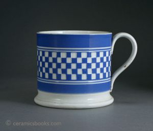 Banded ware engine turned tankard with blue slip ground (related to Mocha ware). 97 mm High. 1830-1860. AP/001.