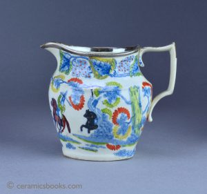 Napoleonic pearlware jug with silver lustre. 'Cossacks method of Attack'. 127mm High. c.1815-1820. AP/1060.