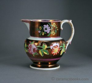 Pearlware pink & copper lustre jug with enamelled sprigs. 136mm High. c.1825-1835. AP/177.