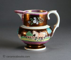 Small pearlware jug with pink & copper lustre. Enamelled farmyard sprigs. 94mm High. c.1820-1830. AP/322.