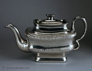 Silver lustre teapot, gadrooned, redware body . 114mm High. c.1820-1830. AP/389.