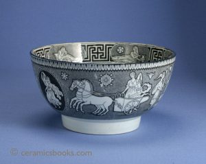 Pearlware bowl with 'Greek' pattern black transfer print. Inside has print of a crowned lady (poss. Queen Caroline?). 81mm High. c.1810-1820. AP/418.