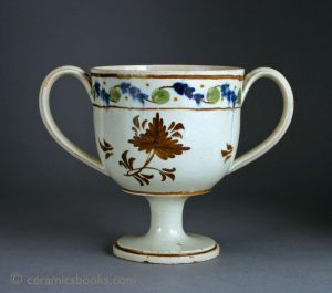 Pearlware 'prattware' type loving cup. 130mm High. c.1790-1810. AP/448.