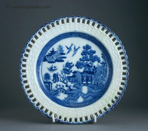Pearlware arcaded 'ribbon' plate, willow pattern. 210mm Wide. c.1800-1820. AP/529.