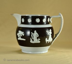 Pearlware jug with brown slip ground and sprigs incl. 'Andromache', 'Bourbonais Shepherd' etc. 143mm High. c.1820-1835. AP/585.