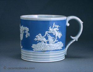 Pearlware mug with blue slip ground and sprigs of Mercury etc.. 92mm High. c.1820-1830. AP/611.