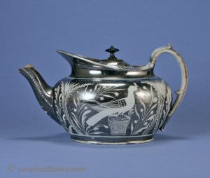 Pearlware silver resist lustre teapot with bird on basket. 129mm High. AP/660.