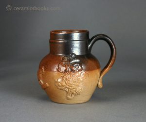 Salt-glazed stoneware mustard (?) pot with sprigs incl. 'Spring'. Probably Derbyshire. 82mm High. c.1830-1850. AP/070.