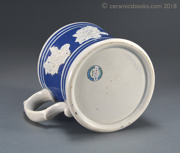 Pearlware banded ware frog mug with white flower sprigs c.1845 - 1870. Base. AP/1041.
