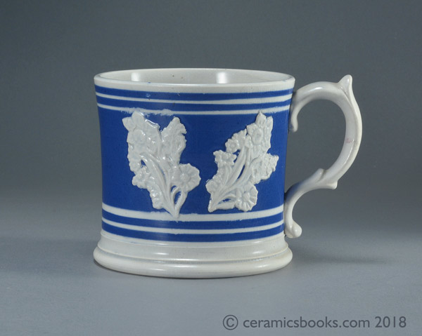Pearlware banded ware frog mug with white flower sprigs c.1845 - 1870. Obverse. AP/1041.