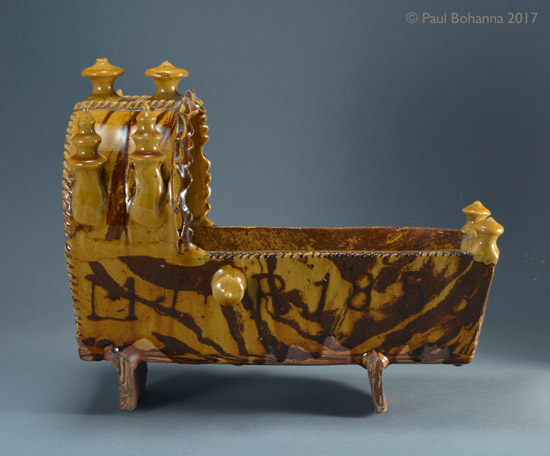Agateware cradle with slip inscription “M J + R 1856”. Attributed to Woodman House Pottery, Halifax. Reverse 2. P/1072.