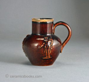 Small treacleware jug with Ceres, Polymnia and Plenty sprigs. 84mm High. c.1835-1855 . AP/110.