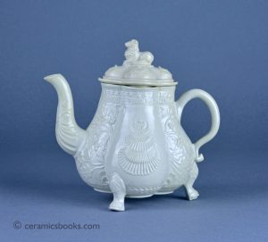 Staffordshire white salt-glaze stoneware lobed body teapot with shells and acorns. 157mm High to top of lid. c.1745-1755. AP/1245.