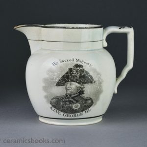 rare pearlware jug with commemorative bat prints of George III and the Duke of Kent. Obverse. AP/1253.