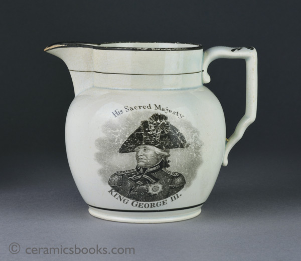rare pearlware jug with commemorative bat prints of George III and the Duke of Kent. Obverse. AP/1253.