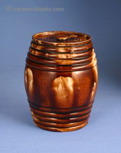 Two-tone treacleware, tobacco jar 'coopered barrel'. Probably Scottish. 131mm High. c.1865-1885. AP/412.