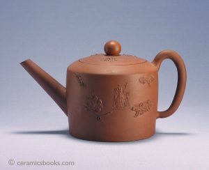 Red stoneware teapot, applied sprigs. Pseudo seal mark. Probably Staffordshire. 132mm High. c.1750-1760. AP/474.