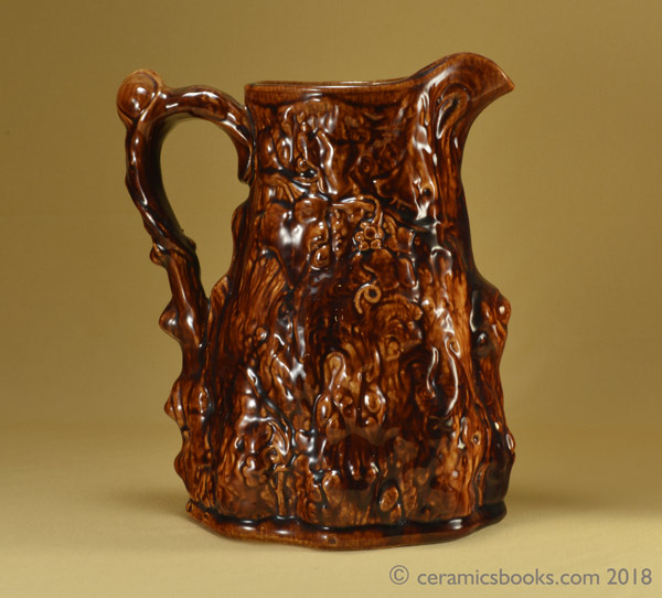 Large moulded jug ‘Babes in the Wood’ with two-tone treacleware glaze. Reverse. AP/695.