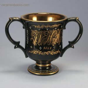 Jackfield glazed two-handled loving cup with ‘W H A’ monogram, dated 1861. Obverse. AP/779