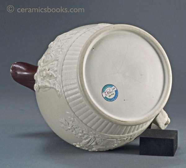 Large white felspathic stoneware jug with ‘Three Graces’ sprigs etc. Probably Davenport c.1805-1830. Base. AP/792.