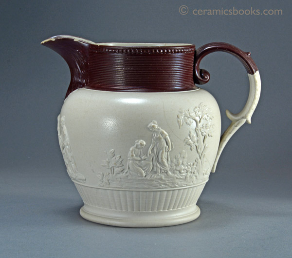 Large white felspathic stoneware jug with ‘Three Graces’ sprigs etc. Probably Davenport c.1805-1830. Obverse. AP/792.