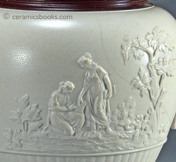 Large white felspathic stoneware jug with ‘Three Graces’ sprigs etc. Probably Davenport c.1805-1830. Obverse sprig. AP/792.