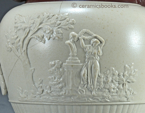 Large white felspathic stoneware jug with ‘Three Graces’ sprigs etc. Probably Davenport c.1805-1830. Reverse sprig. AP/792.