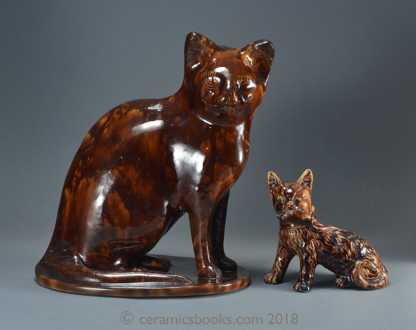 Large two-tone treacleware cat figure with cat moneybox. AP/805.