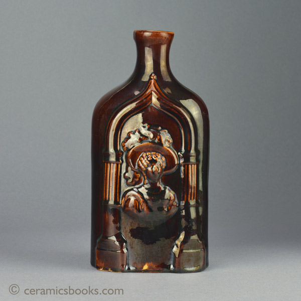 Treacleware (Rockingham glazed) spirit flask with Queen Victoria & the Duchess of Kent. c.1838-1861. Back. AP/839