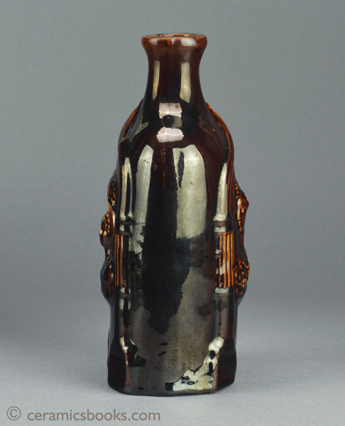 Treacleware (Rockingham glazed) spirit flask with Queen Victoria & the Duchess of Kent. c.1838-1861. Side two. AP/839