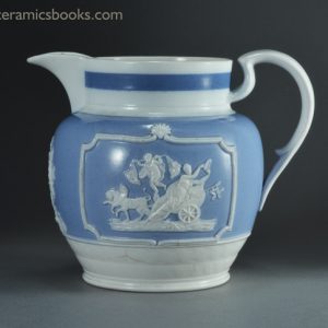 Porcelainous china jug with blue slip ground and white sprigs c.1815-1830. Obverse. AP/852
