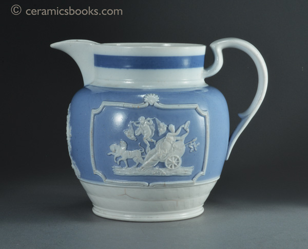 Porcelainous china jug with blue slip ground and white sprigs c.1815-1830. Obverse. AP/852