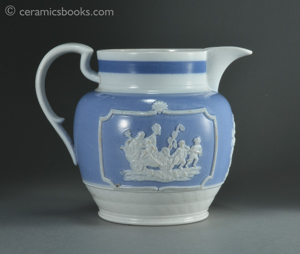 Porcelainous china jug with blue slip ground and white sprigs c.1815-1830. Reverse. AP/852