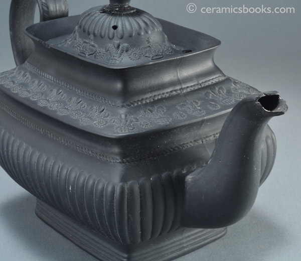 Black basalt teapot with crowns and Prince of Wales feathers possibly for coronation of King George IV. Spout. AP/859