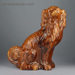 Very large two-tone treacleware spaniel dog figure. Obverse. AP/924.