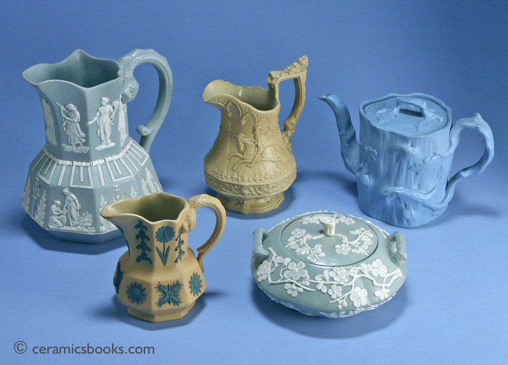 Group of coloured body moulded stoneware. Including Spode, Ridgway and Minton. c.1825-1850.