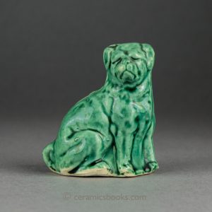 Green-glazed dog moneybox. Possible Austrian c.1890-1920. AP/1218.