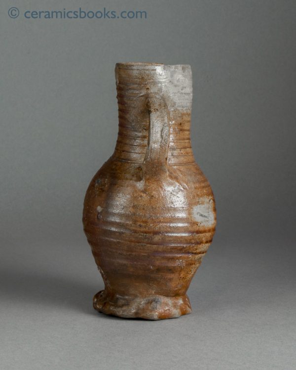 Medieval salt-glazed stoneware jug, probably early Siegburg c.1375-1450. Back.