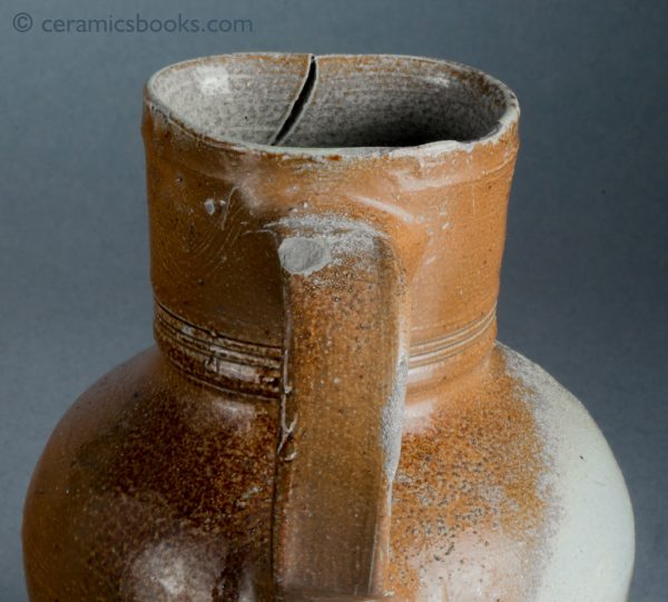 German brown stoneware jug, salt-glazed. Probably Raeren. c.1550-1600. Rim.