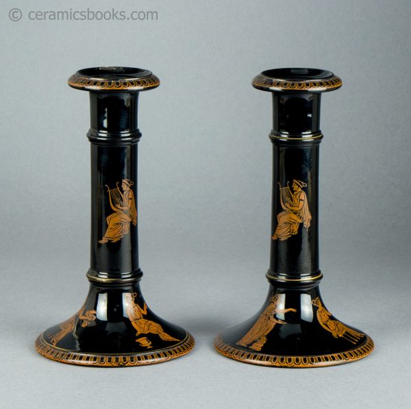 Jackfield" type candlesticks with classical Greek figure prints. c.1860-1890. AP/1081/1082. Obverse.