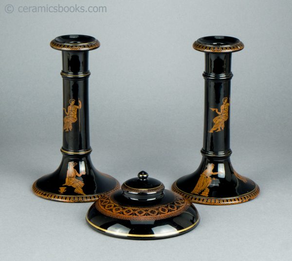 Jackfield" type candlesticks and inkwell group. c.1860-1890.