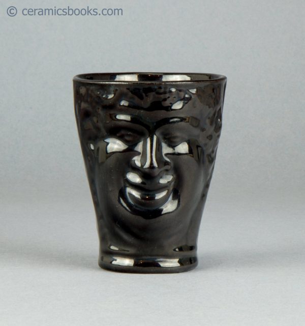 "Jackfield" type Bacchus cup or beaker with two faces. c.1775-1800. AP/689. Reverse.