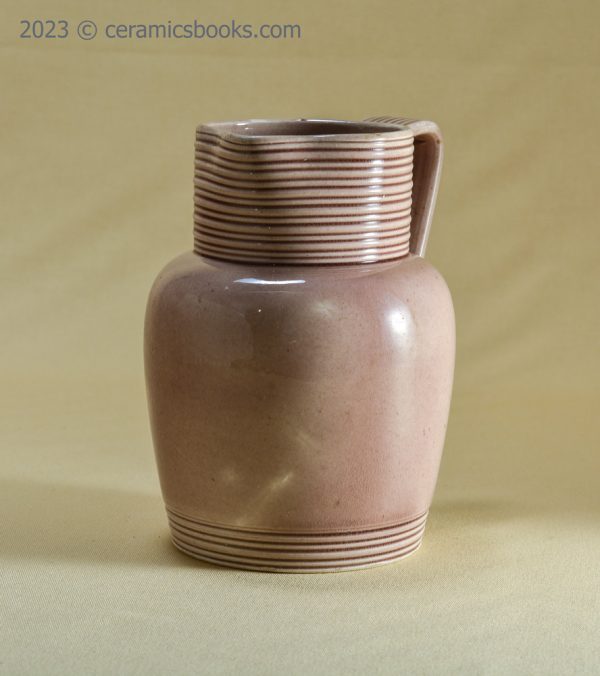 Pale manganese purple Rockingham jug. Possibly French. c.1830-1850. AP/1043. Spout.
