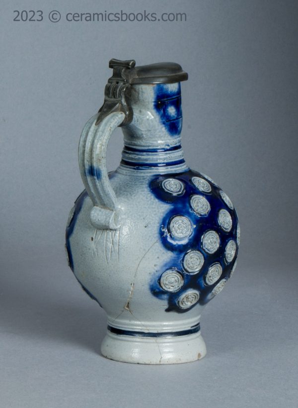Westerwald saltglaze stoneware mask jug with roundels. c.1665-1680. AP/1276. Reverse back.