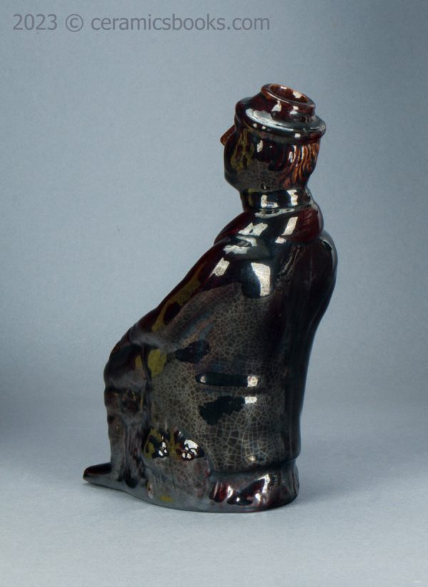Treacleware spirit flask, old man with walking stick. c.1840-1865. AP/1370. Back obverse.